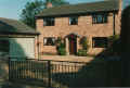 New house next to old shop